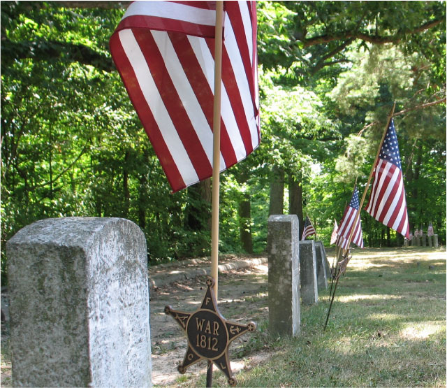 Fort Amanda — gravestones and flags